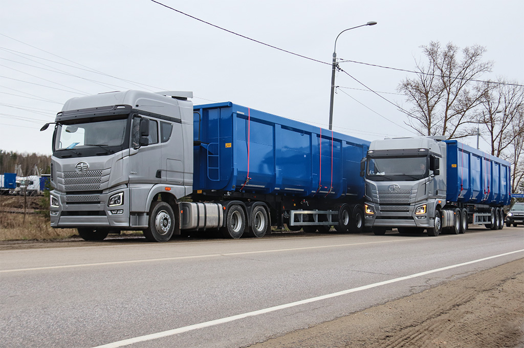 FAW ORYX 6х4 с полуприцепами-ломовозами Тонар SH3-74М
