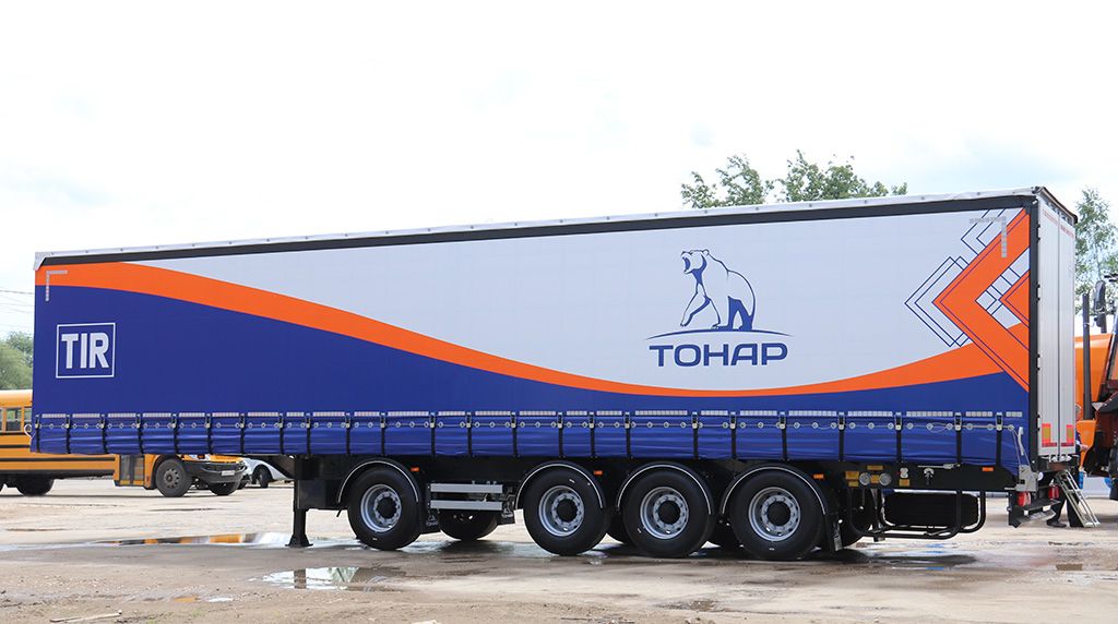 Тентованный полуприцеп Тонар T4-13VК, вид сбоку